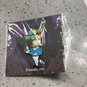 Meow Wolf Colorful Enamel Pin from Vegas